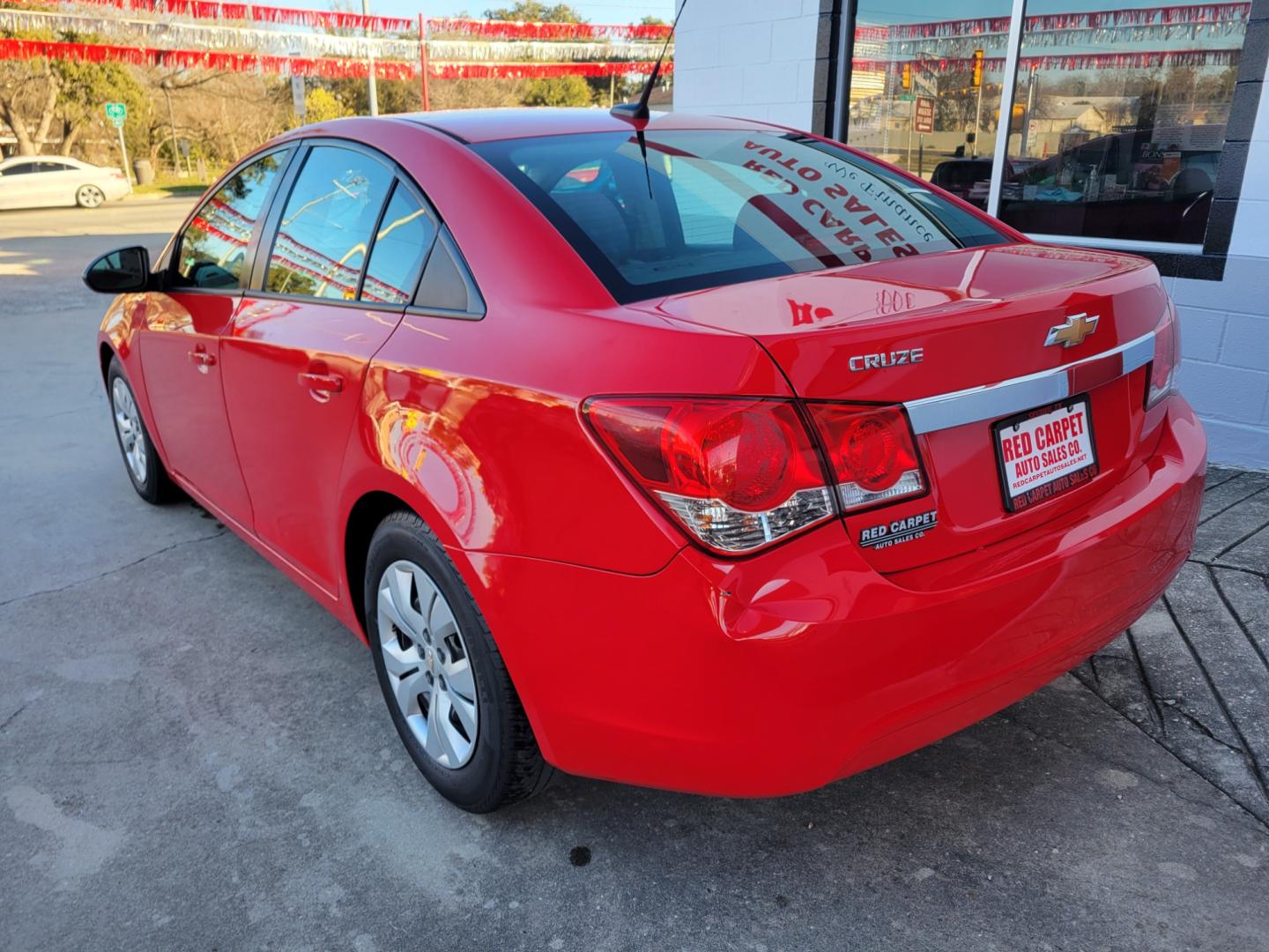 2014 Red Chevrolet Cruze LS Auto (1G1PA5SH8E7) with an 1.8L L4 DOHC 16V FFV engine, 6-Speed Automatic transmission, located at 503 West Court, Seguin, TX, 78155, (830) 379-3373, 29.568621, -97.969803 - Photo#3